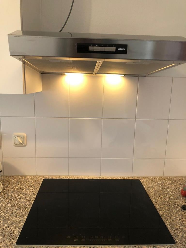 Atag afzuigkap en Whirlpool inductiekookplaat, Ophalen