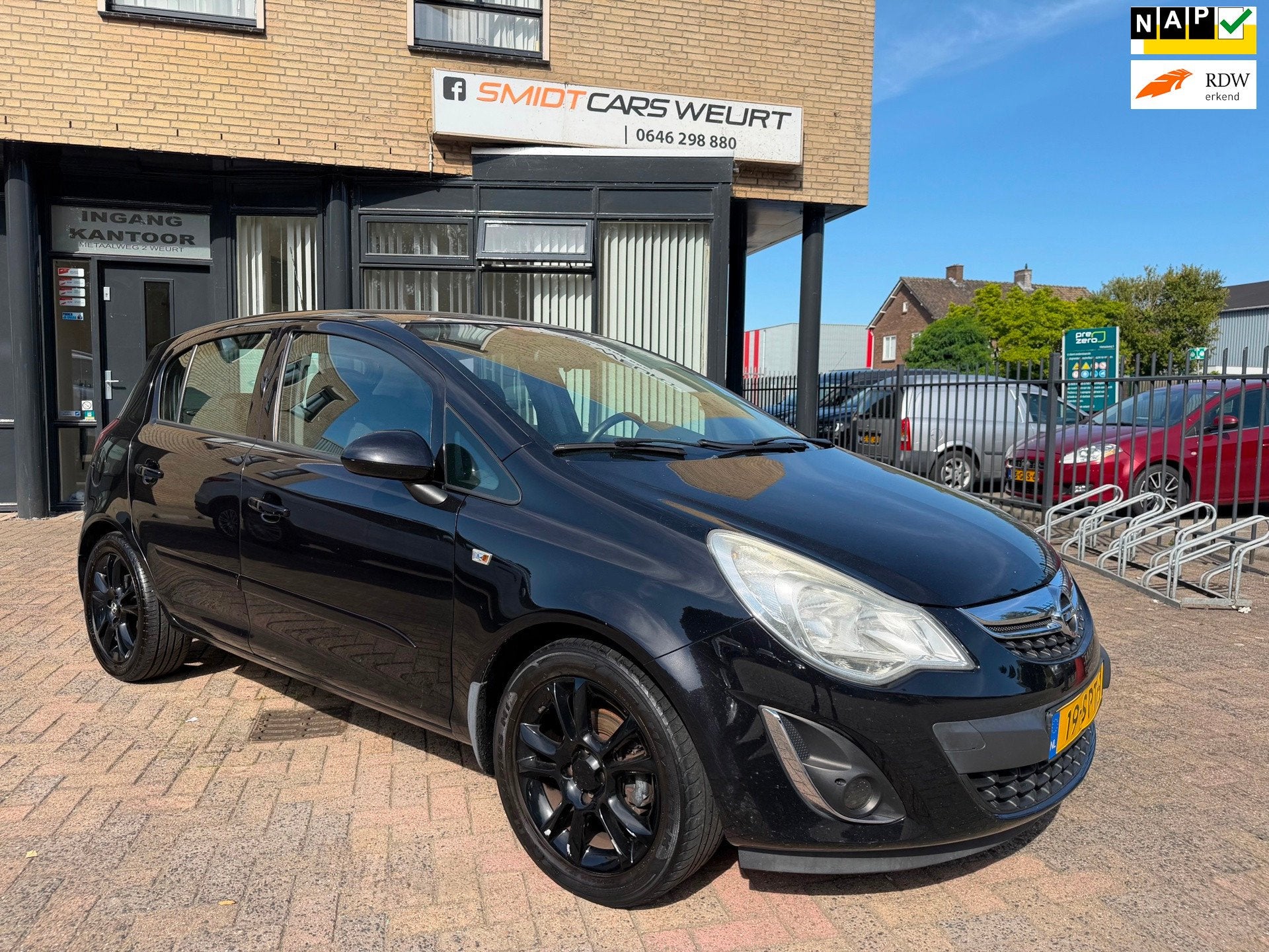 Opel Corsa 1.2-16V Cosmo Airco Navi Cruise, Auto's, Voorwielaandrijving, Euro 5, Gebruikt, Zwart