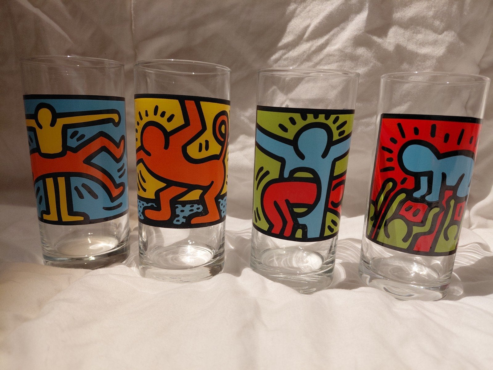 vintage 4 + 1 complete set Keith Haring long glazen, Ophalen, Zo goed als nieuw, Frisdrankglas