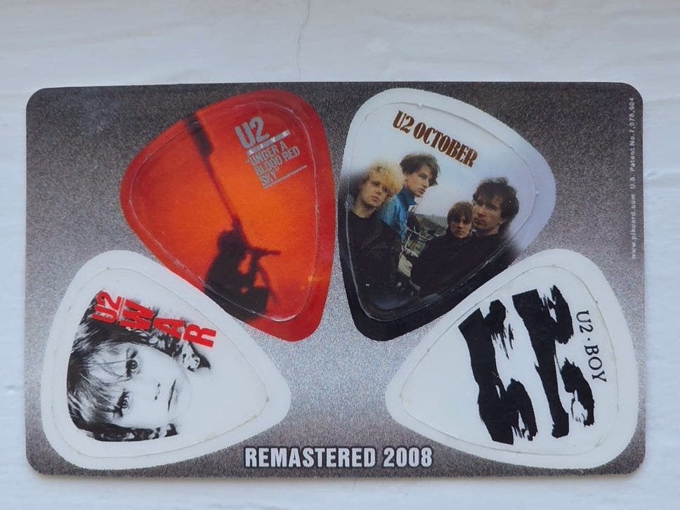 U2 pikcard met 4 plectrums, Ophalen, Nieuw, Foto of Kaart