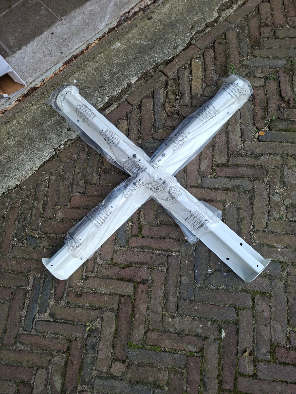 Onderdelen voor een zware parasol., Ophalen