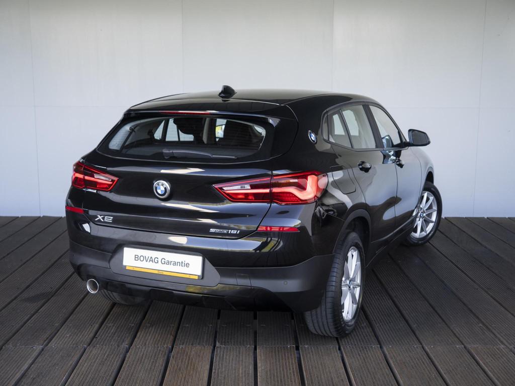BMW X2 sDrive18i | Cruise Control | Stoelverwarming | PDC |, Auto's, 12 maanden, Gebruikt, Euro 6, Zwart