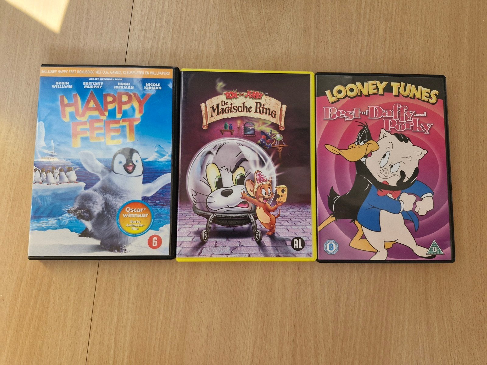 Warner Bros DVD's: Happy Feet, Tom & Jerry, Looney Tunes, Gebruikt, Animatie, Nederlands, Ophalen of Verzenden