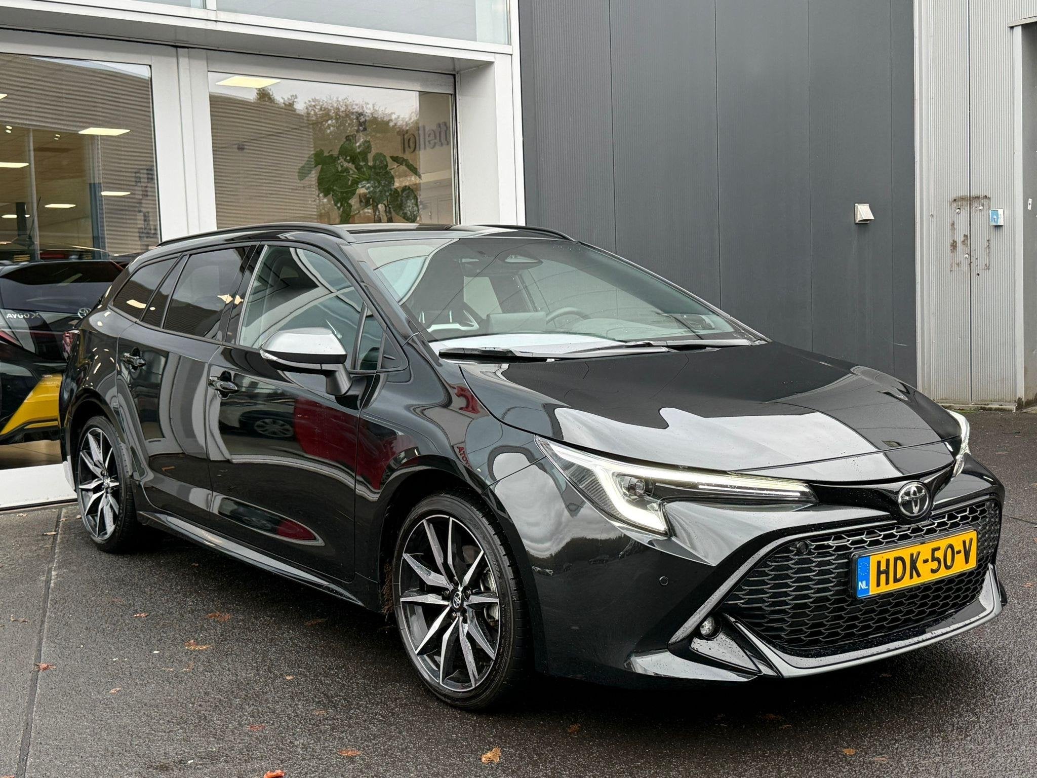 Toyota Corolla Touring Sports Hybrid 200 GR Sport Plus Schui, Auto's, Gebruikt, 4 cilinders, Corolla, Lichtsensor
