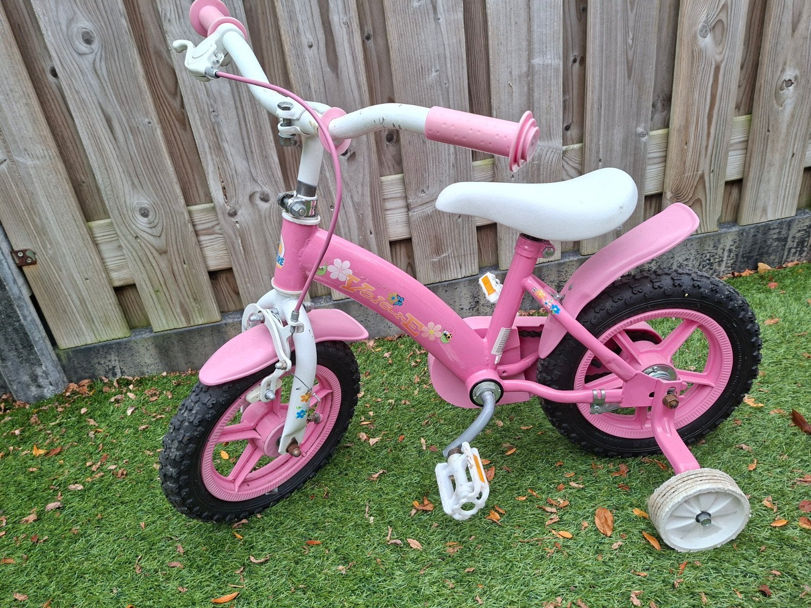 Roze fiets 12 inch, gebruikt maar in goede staat, Fietsen en Brommers, Fietsen | Kinderfietsjes, Ophalen, Terugtraprem, Zijwieltjes