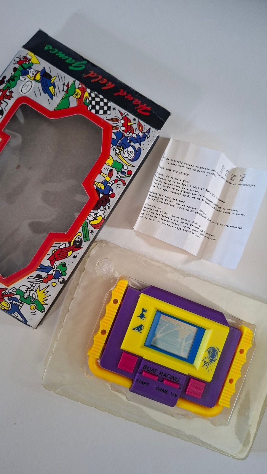 Vintage Handheld Game: Boat Racing (met doos), Spelcomputers en Games, 1 speler, Racen en Vliegen, Nieuw, Ophalen of Verzenden