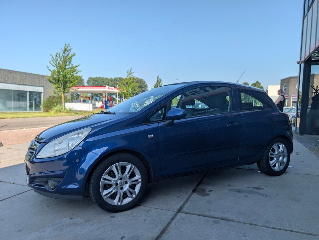 Opel Corsa 1.4-16V Enjoy - Airco - Automaat -, Auto's, Gebruikt, Zwart, 4 cilinders, Blauw
