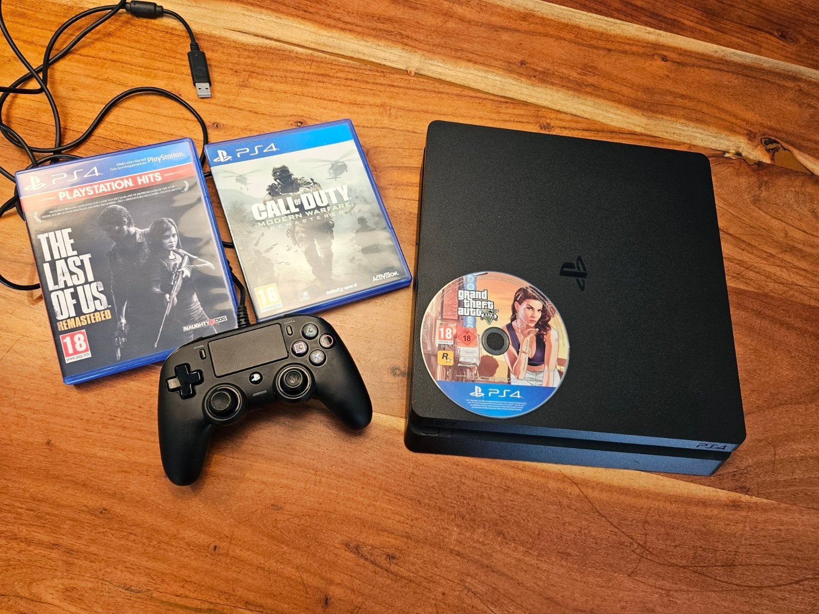 PS4 Slim 500GB☆met Nacon ps contr☆Last of Us☆GTA V☆COD MW☆, Ophalen, Zo goed als nieuw, Met 1 controller, Slim