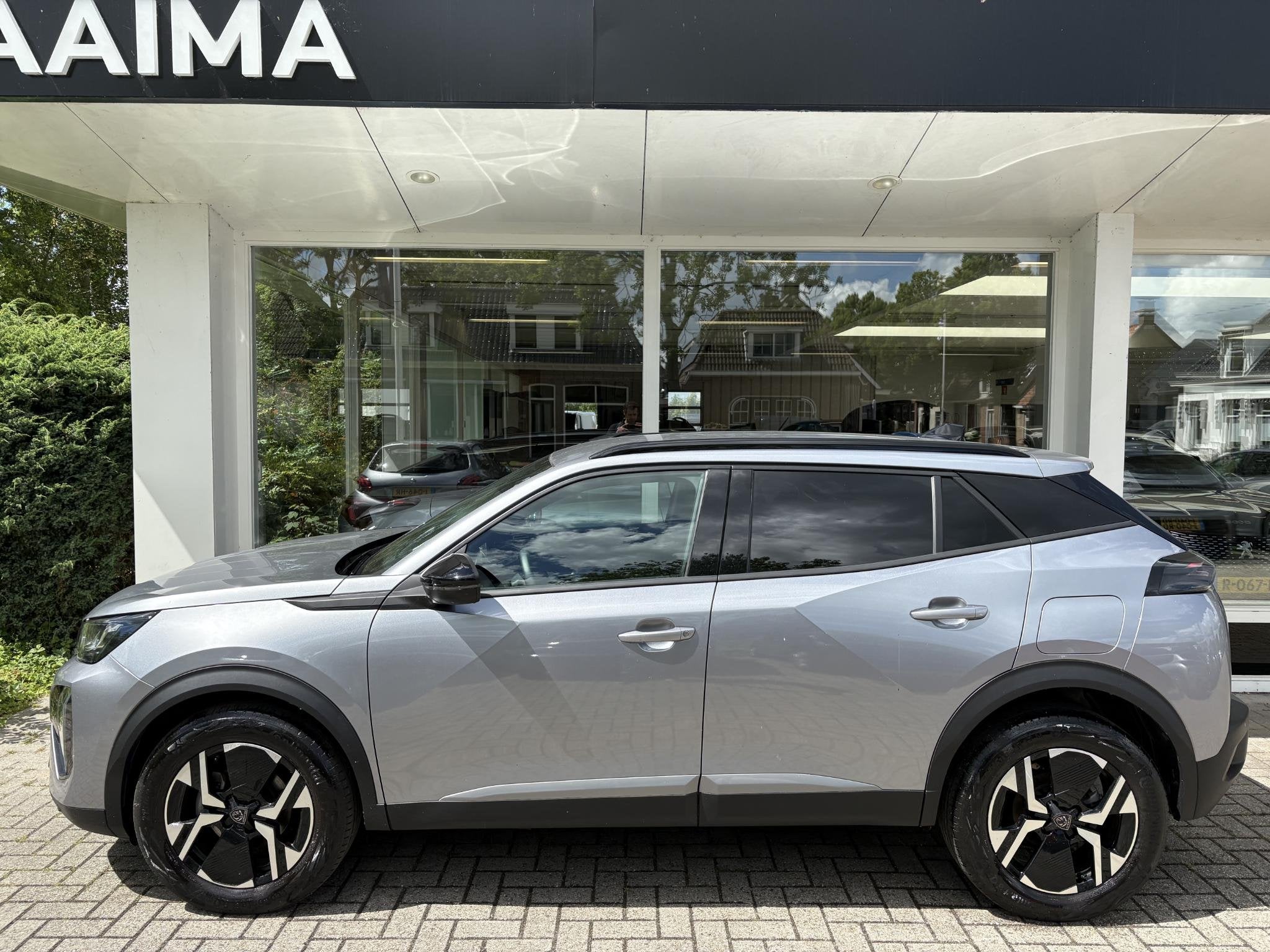 Foto 14 van Peugeot 2008 1.2T 100pk Allure | Achteruitrijcamera | Naviga