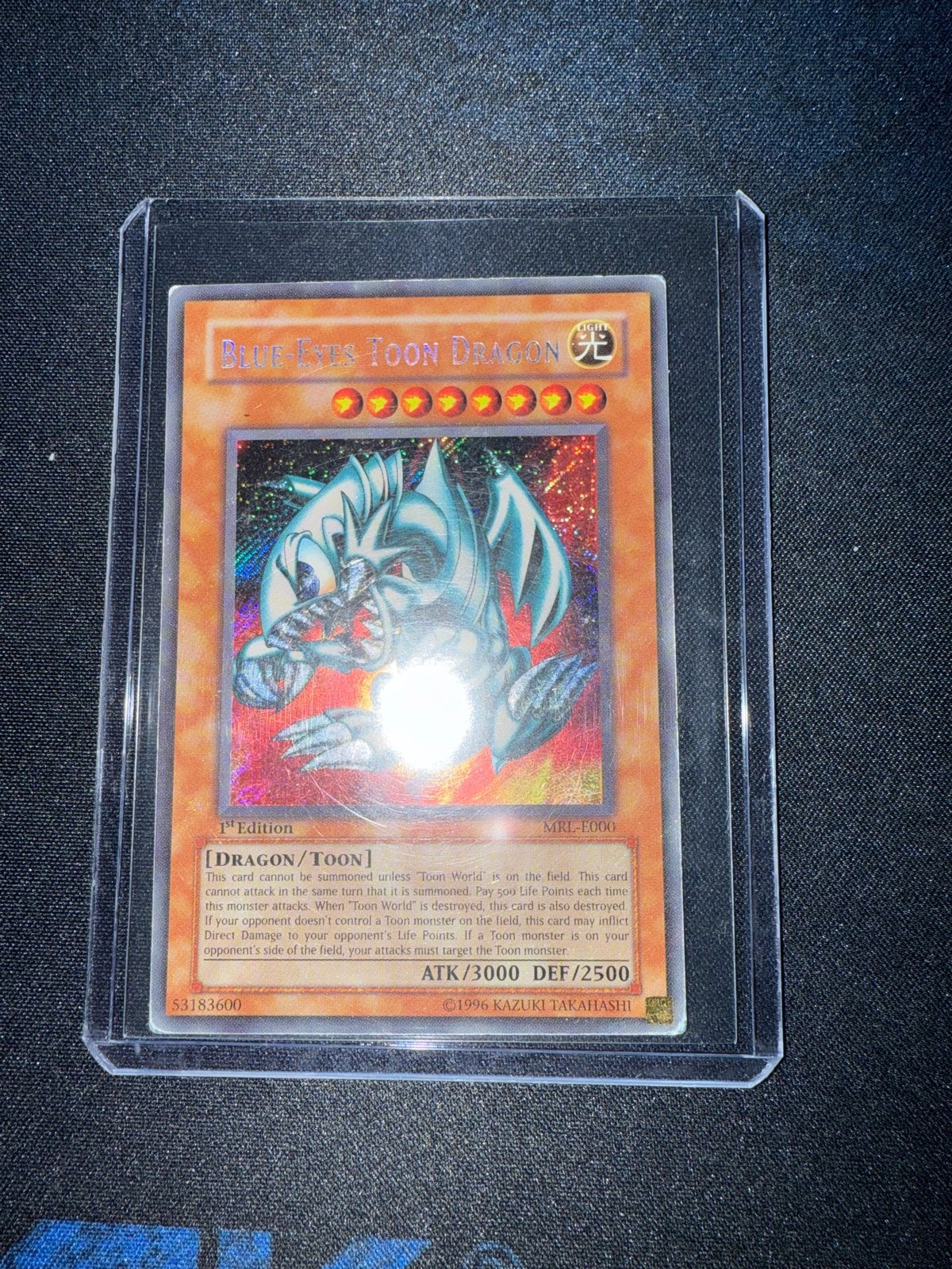 Blue-Eyes Toon Dragon MRL-E000 1st Edition Yu-Gi-Oh! Kaart, Ophalen of Verzenden, Zo goed als nieuw, Losse kaart, Foil