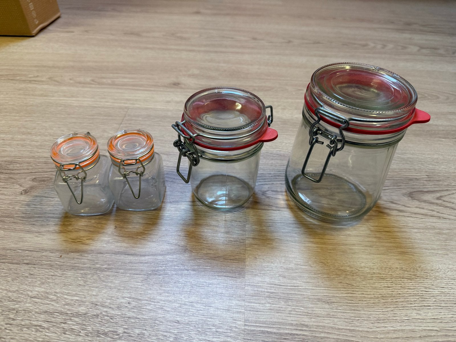 Set van 4 glazen voorraadpotten met beugelsluiting, Ophalen of Verzenden, Voorraadpot, Meerkleurig, Overige merken