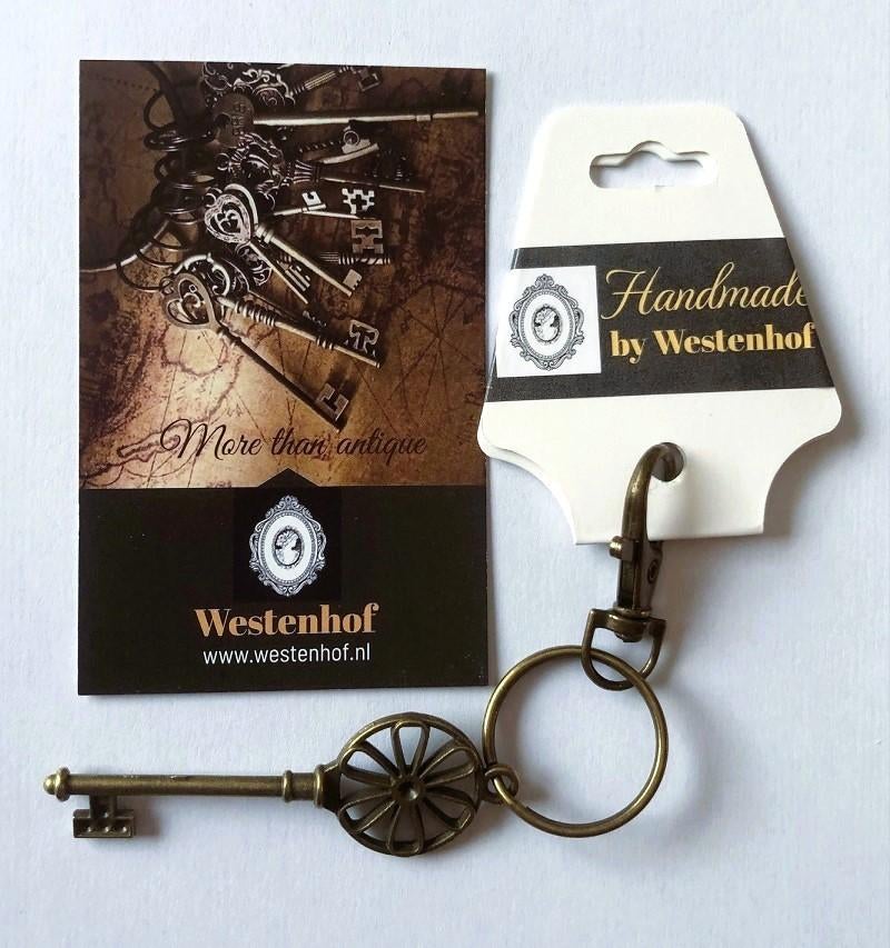 Antiek Sleutelhanger metaal brons met bloem, Verzenden, Nieuw, Overige typen