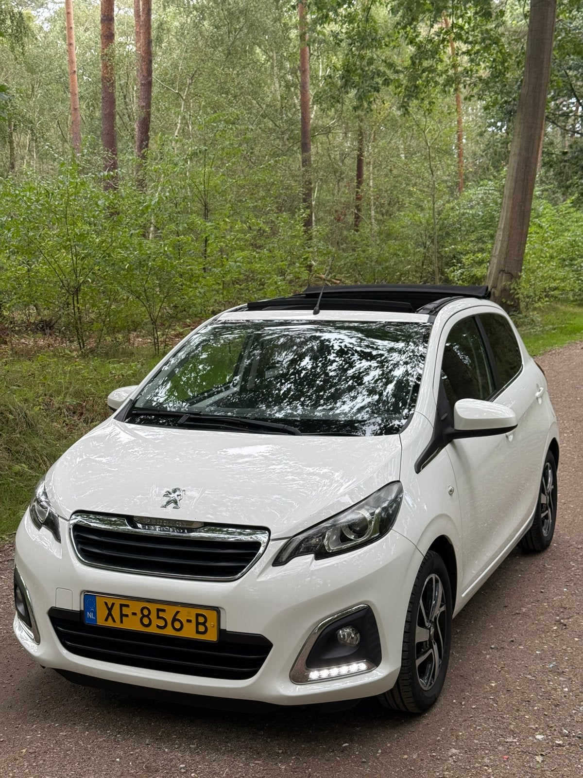 Peugeot 108 1.0 E-vti 72pk automaat cabrio, Auto's, Stof, Zwart, Parkeersensor, 4 stoelen