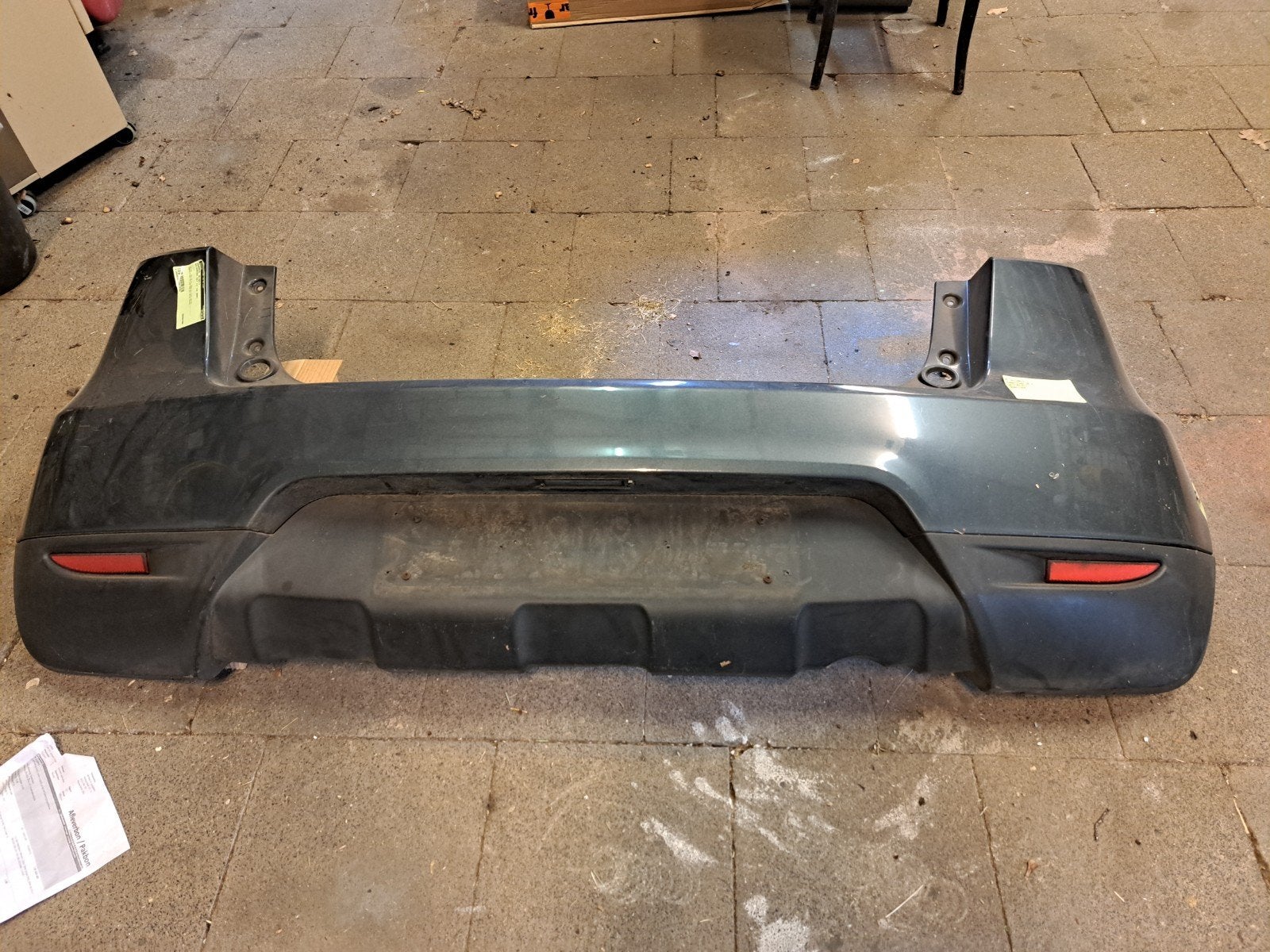 Bumper Mitsubishi Colt 2009 kleur muisgrijs, Ophalen, Nieuw, Mitsubishi, Bumper