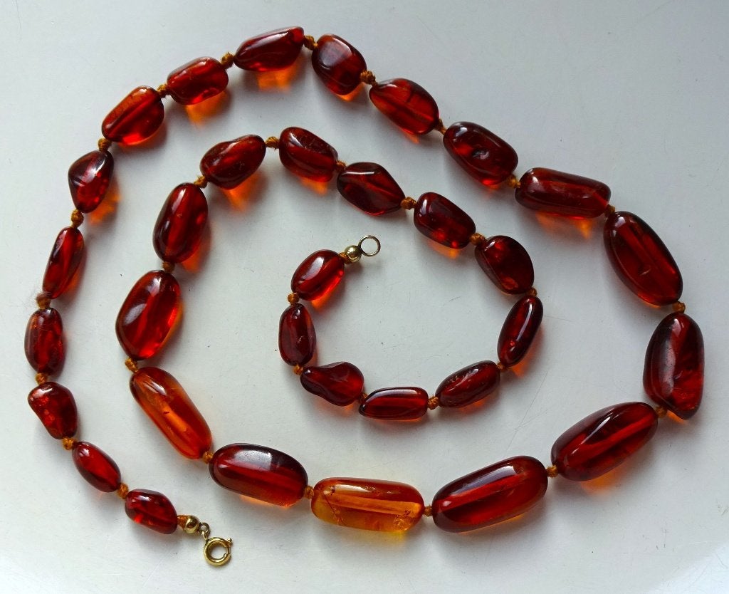Vintage geknoopte Baltische barnsteen ketting: toelopend, Ophalen of Verzenden, Overige materialen, Ketting, Met edelsteen