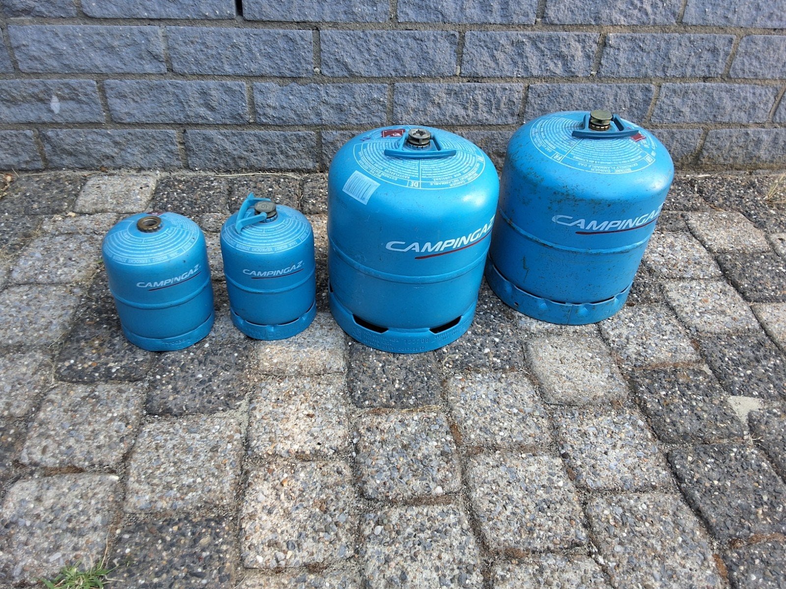 Campinggasflessen leeg, Ophalen