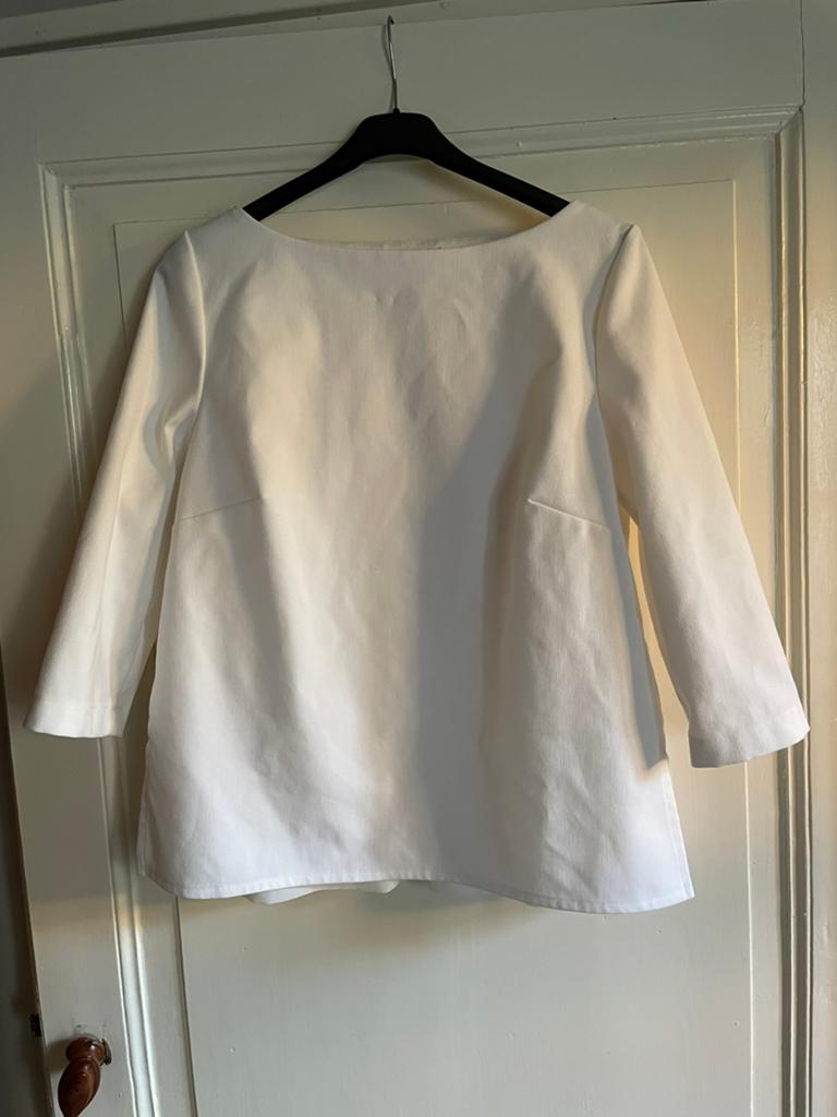 Wittw blouse van nikkie, Ophalen of Verzenden, Zo goed als nieuw, Maat 38/40 (M), Wit
