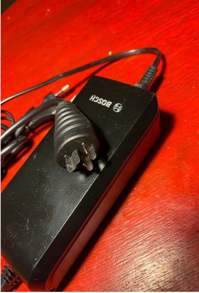 Bosch Accu Lader origineel z.g.a.n Centrum Amsterdam € 65,00, Ophalen, Zo goed als nieuw