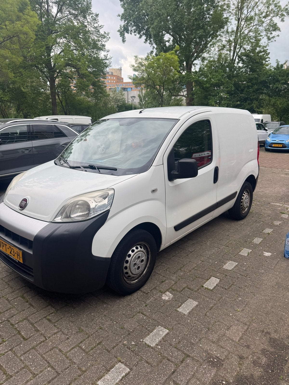 Fiat Fiorino 1.3 16v Multijet 75pk 2015 Wit, Auto's, Bestelauto's, Voorwielaandrijving, Euro 5, Stof, 74 pk