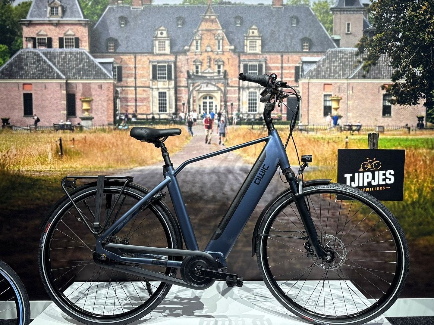 QWIC Premium MN7 elektrische Herenfiets Blauw | Actie €1.799
