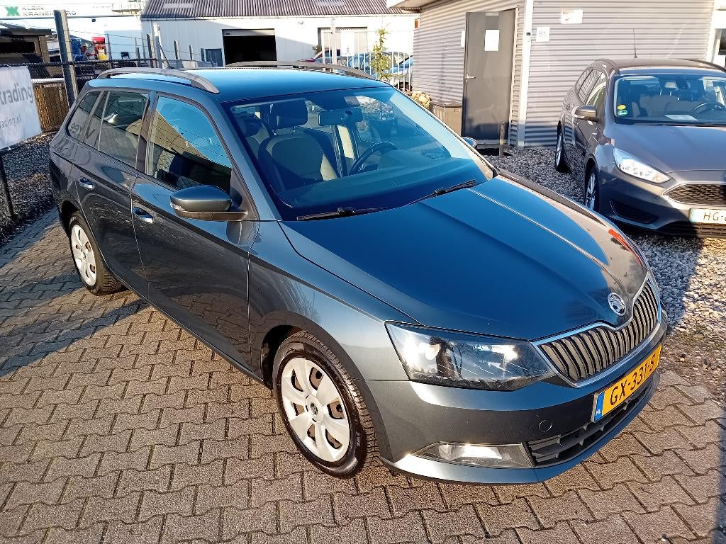 Skoda Fabia 1.4TDI 66KW Combi 2015 APK 01-2027, Auto's, Skoda, Voorwielaandrijving, Start-stop-systeem, Stof, Euro 6