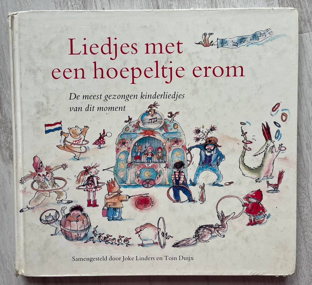 T. Duijx - Liedjes met een hoepeltje erom, Boeken, Kinderboeken | Kleuters, Zo goed als nieuw, Fictie algemeen, Ophalen of Verzenden