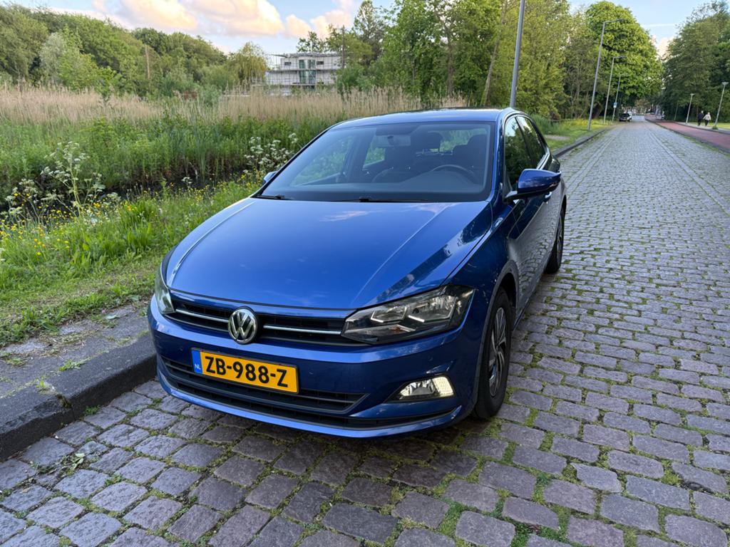 Volkswagen Polo 1.0 TSI 95pk 2019 Blauw, Voorwielaandrijving, Stof, 40 €/maand, Zwart