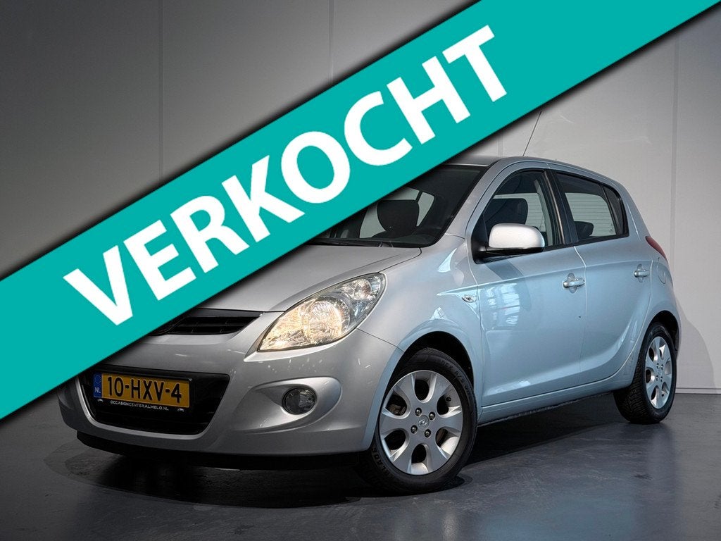 Hyundai I20 1.4i i-Catcher /Airco/Elek. Pakket/Leer/LMV, Auto's, Hyundai, Voorwielaandrijving, 4 cilinders, 1396 cc, Automatische klimaatregeling