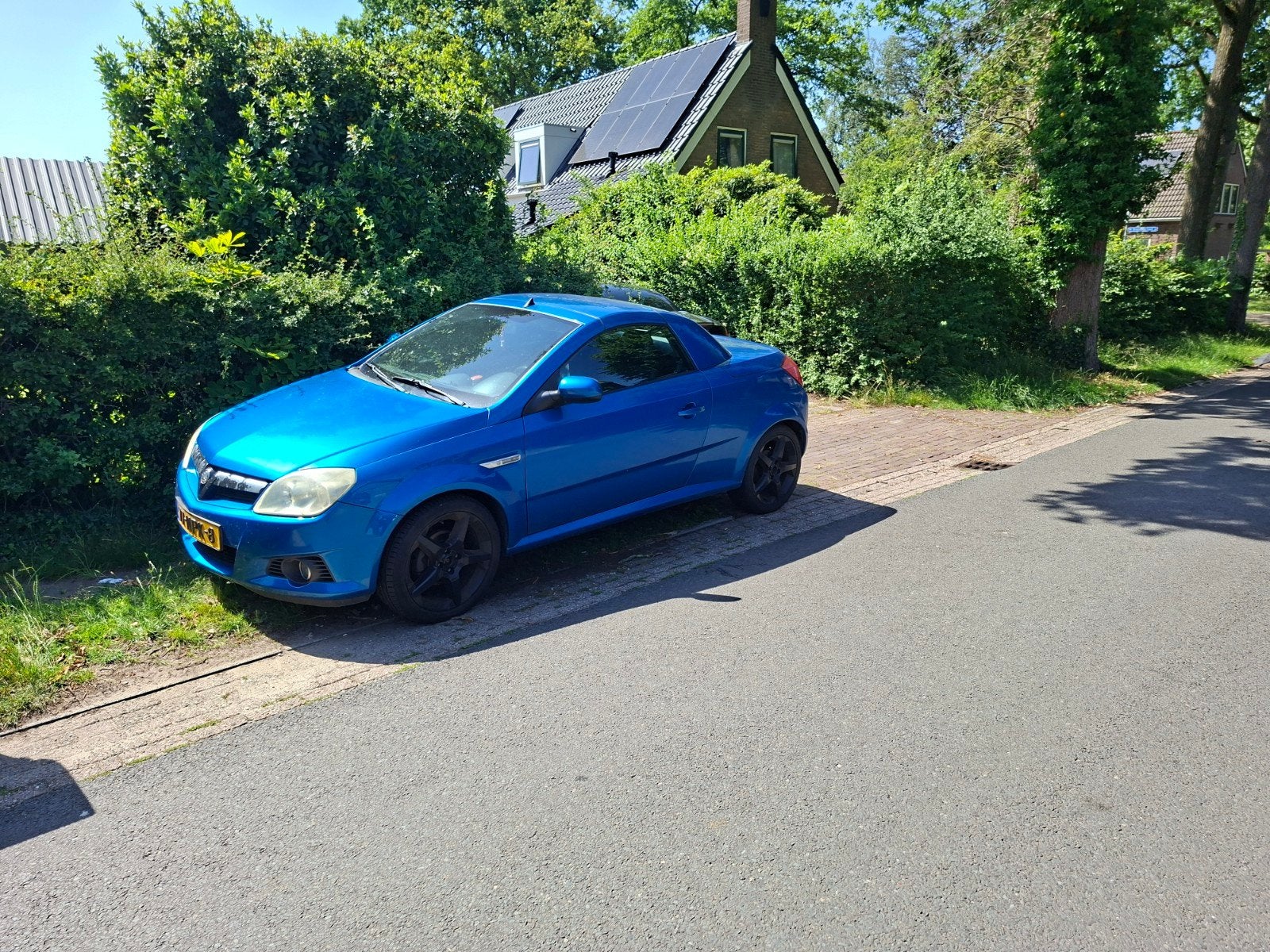 Opel Tigra 2004 Blauw, Auto's, Voorwielaandrijving, 125 pk, Zwart, Blauw