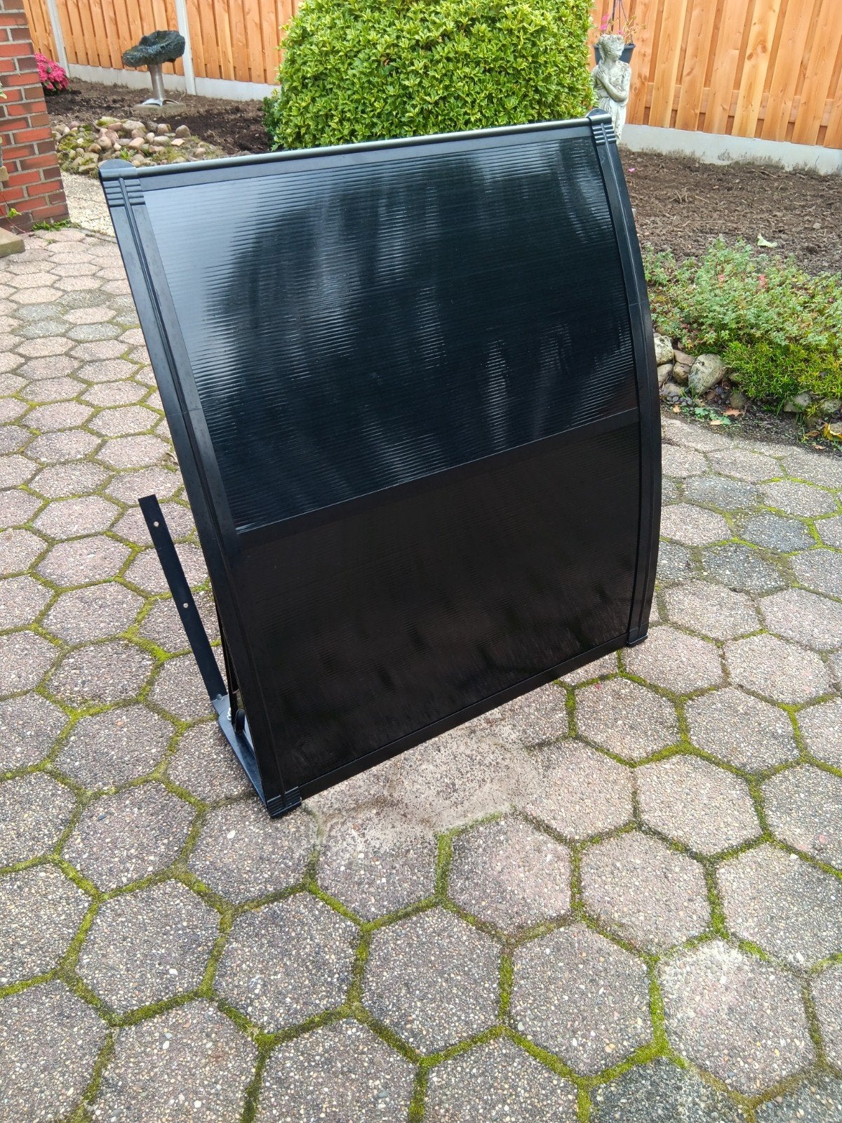 Voordeurluifel, zwart kunststof, Ophalen, Zo goed als nieuw