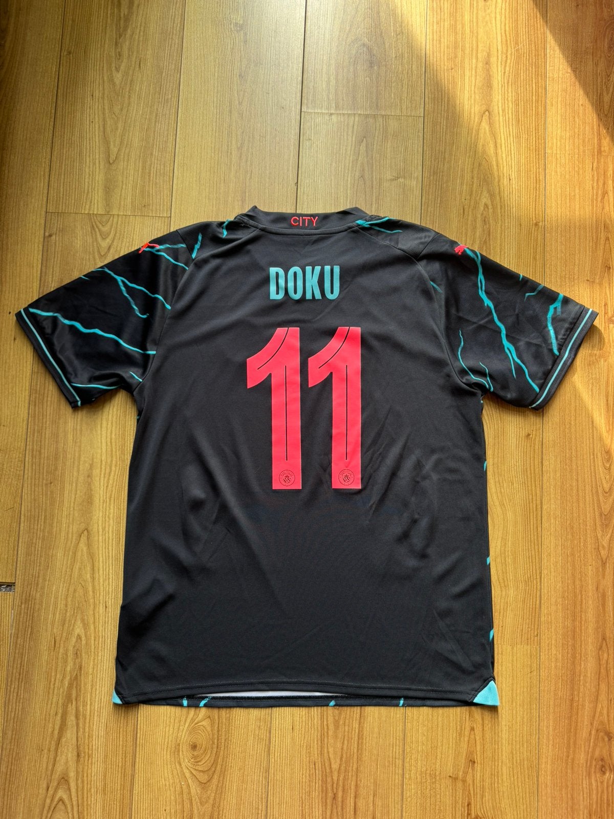 Origineel voetbalshirt Manchester City Jeremy Doku #11, Maat L, Ophalen of Verzenden, Zo goed als nieuw, Shirt