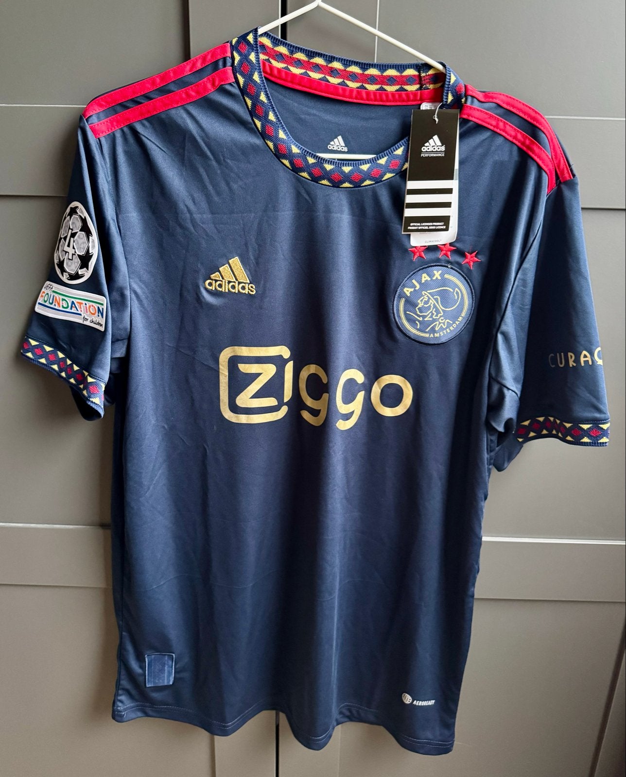 Ajax uitshirt 2022/2023 - Maat L - Nieuw met kaartjes, Maat 52/54 (L), Blauw, Nieuw, Ophalen of Verzenden