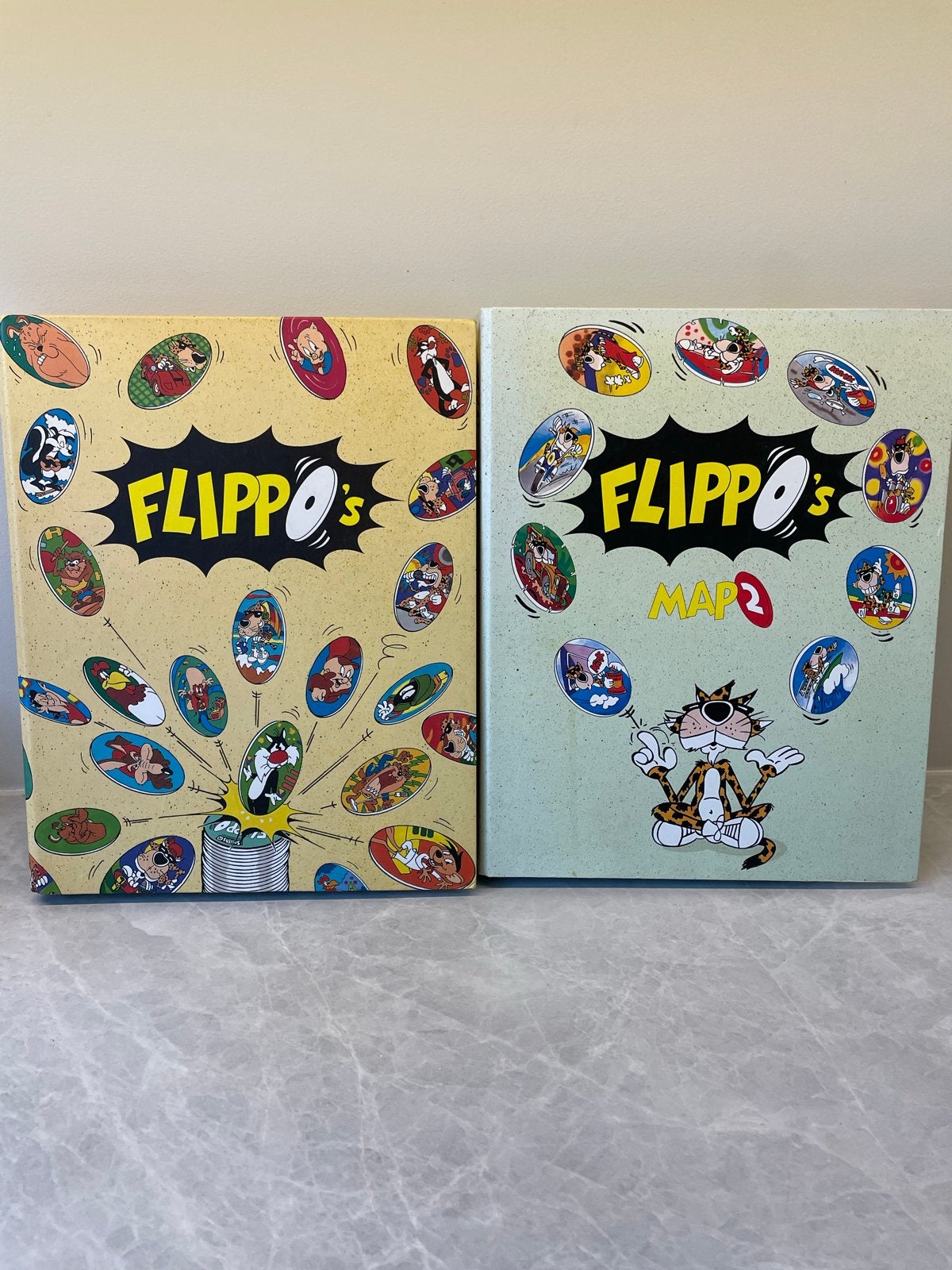 2 Flippo mappen vol met diverse Flippo's en tussenpagina's, Ophalen of Verzenden, Looney Tunes, Verzameling, Met verzamelmap(pen)