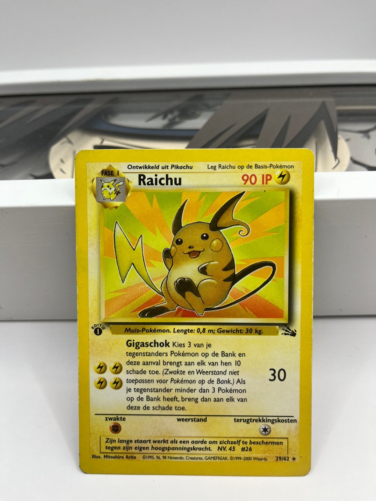 Pokemon Raichu fossil dutch 1e, Ophalen of Verzenden, Zo goed als nieuw, Losse kaart, Foil