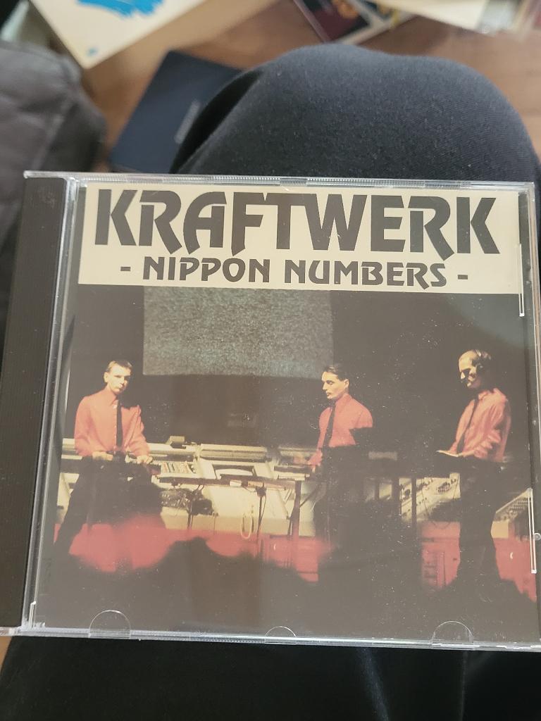 ~Cd~ Kraftwerk - Nippon Numbers, Ophalen, Zo goed als nieuw