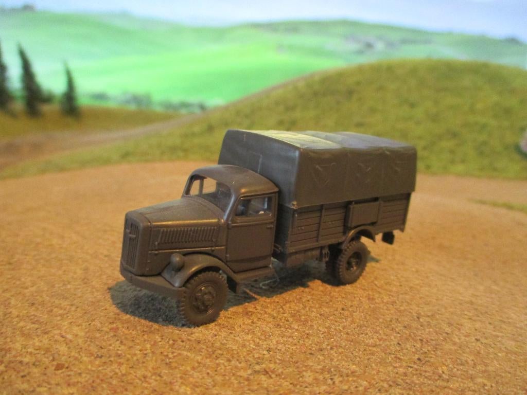 1939 Opel Blitz manschappenwagen met huif - Roco Minitanks, Ophalen of Verzenden, Nieuw, Bus of Vrachtwagen, Roco