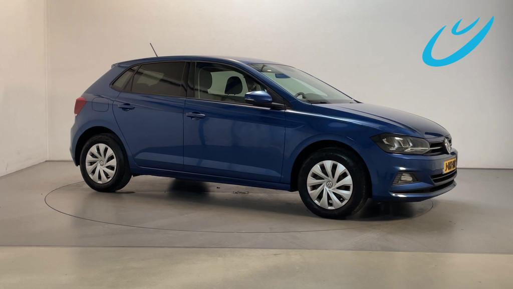 Volkswagen Polo 1.0 TSI Comfortline Parkeersensoren Navigati, Auto's, Voorwielaandrijving, Stof, Gebruikt, 95 pk