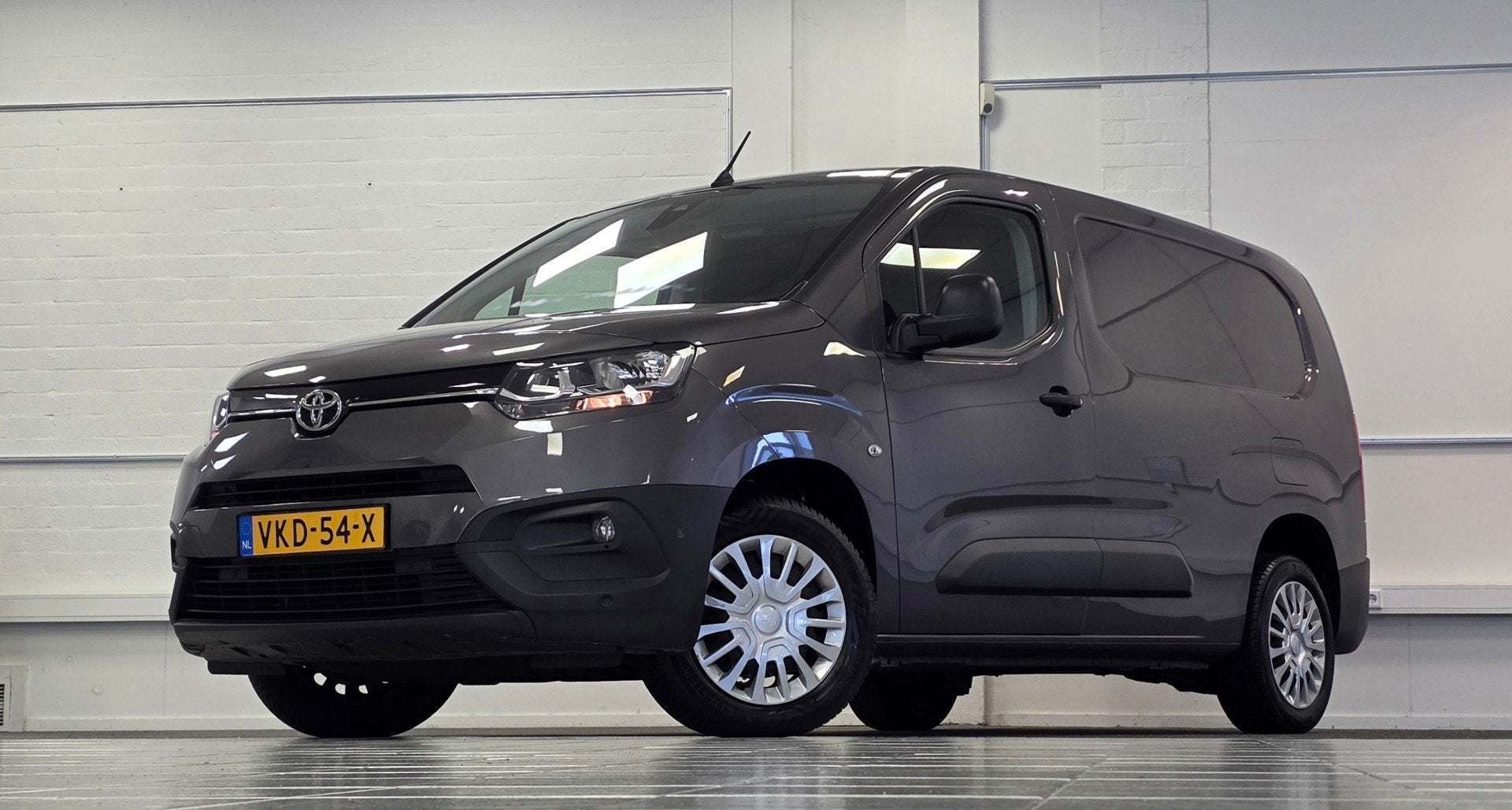 Toyota PROACE CITY 1.2 Turbo Professional Long Trekhaak Navi, Auto's, Stof, Gebruikt, Euro 6, 1199 cc