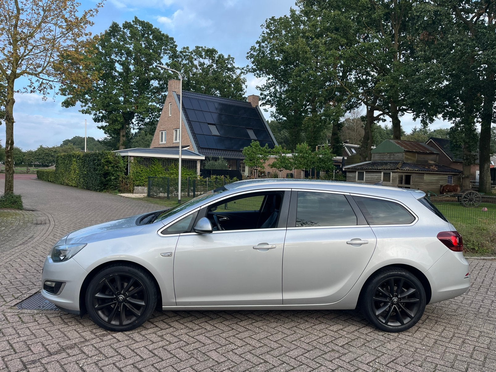 Opel Astra 1.4 Turbo Tourer 2013 navi klima apk zeer mooi, Voorwielaandrijving, Zwart, 4 cilinders, Handgeschakeld