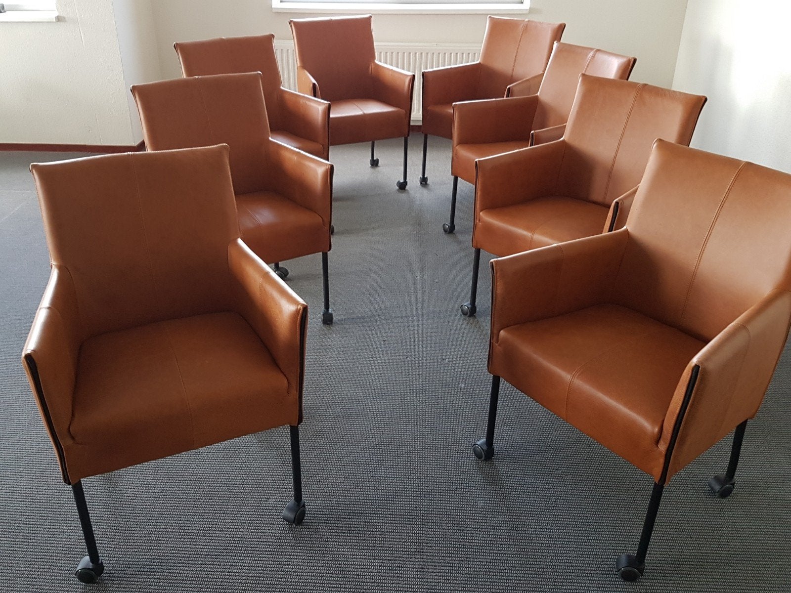 8 Comfortabele Design eetkamerstoelen Bruin Leer, wielen, Bruin, Geraldine charly chaplin montis gelderland goossens leolux stijl