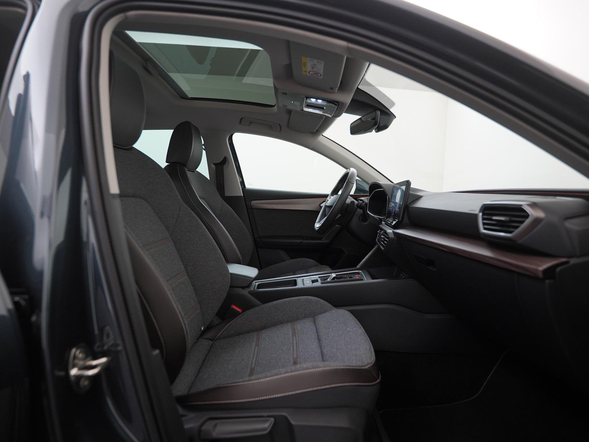 SEAT Leon 1.0 eTSI Xcellence DSG | Schuifdak | Stuurverwarmi, Auto's, Stof, Gebruikt, 3 cilinders, 999 cc
