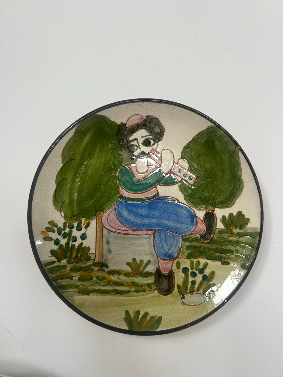 Decoratieve keramische schaal met fluitspeler, Ophalen