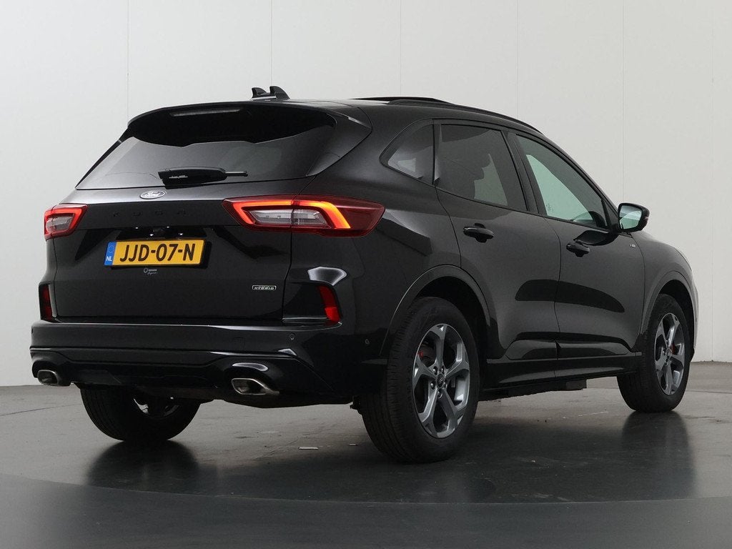 Ford Kuga 2.5 PHEV ST-Line X | Panoramadak | Winterpakket |, Auto's, Ford, 14 kWh, Gebruikt, Leder en Stof, Zwart