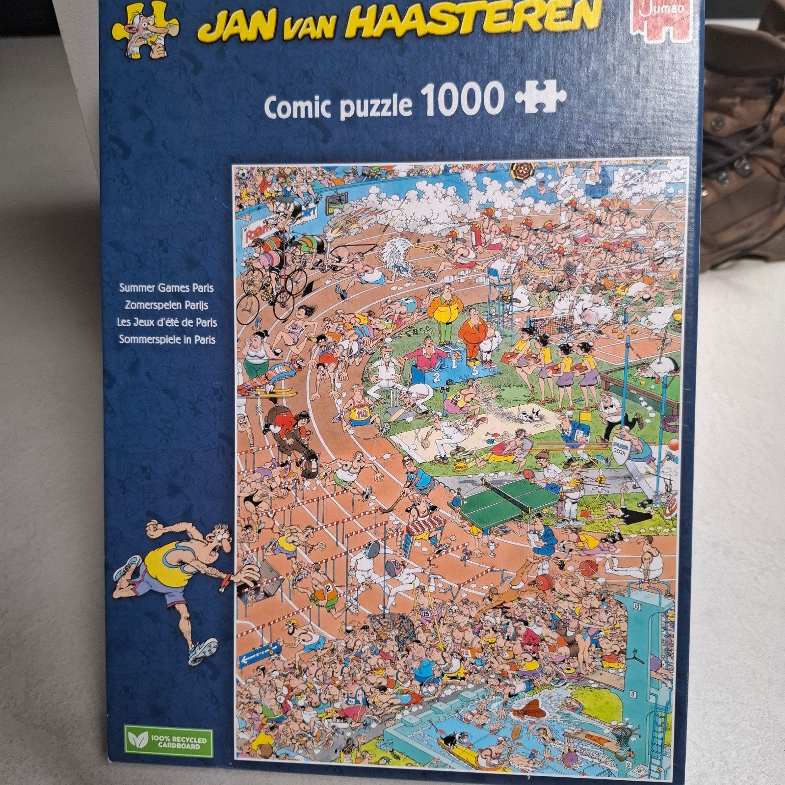 Jan van Haasteren puzzel ( zomerspelen parijs), Ophalen of Verzenden, 500 t/m 1500 stukjes, Zo goed als nieuw, Legpuzzel