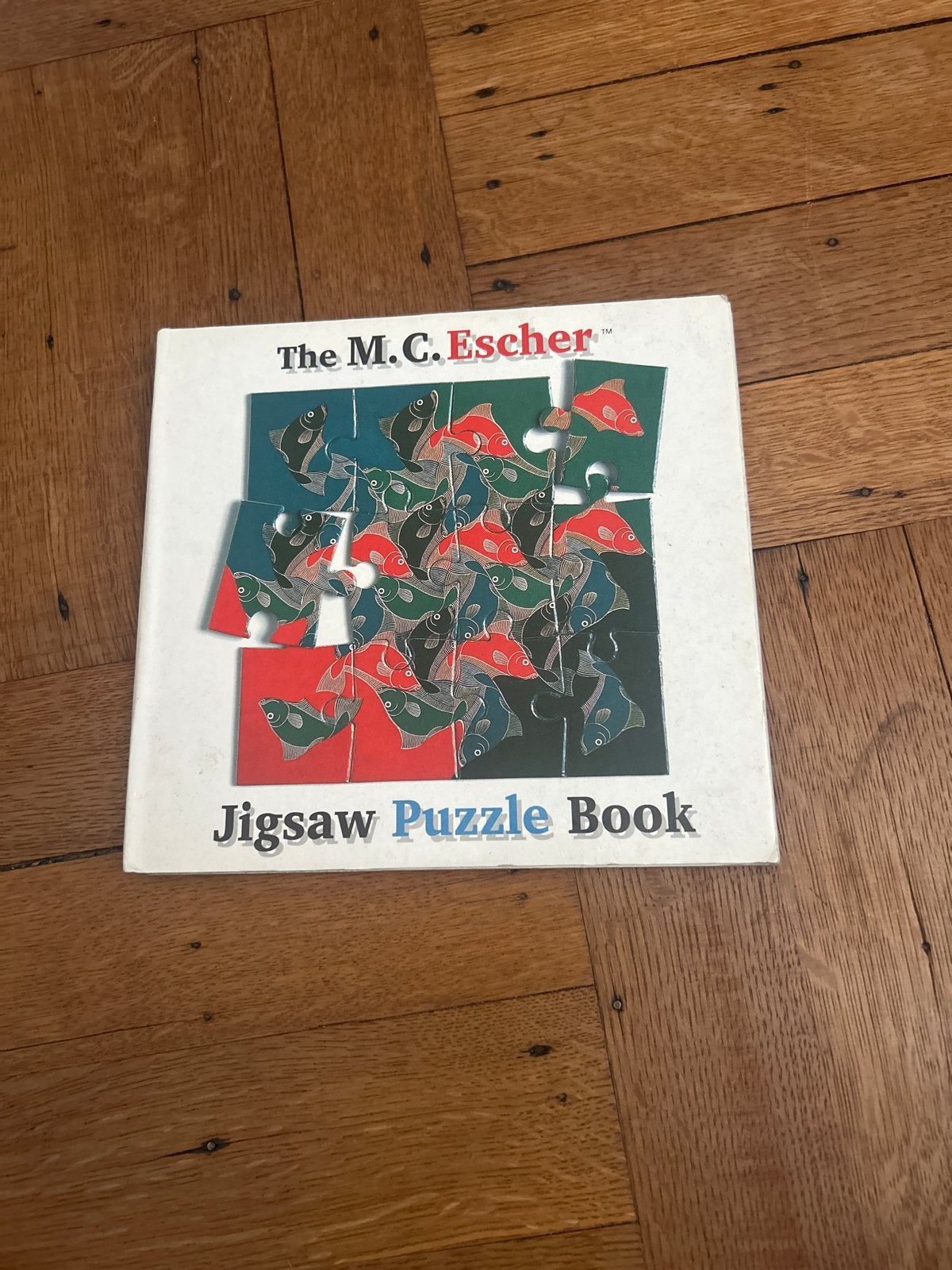 M.C. Escher Jigsaw Puzzle Boek, Ophalen of Verzenden, Gelezen