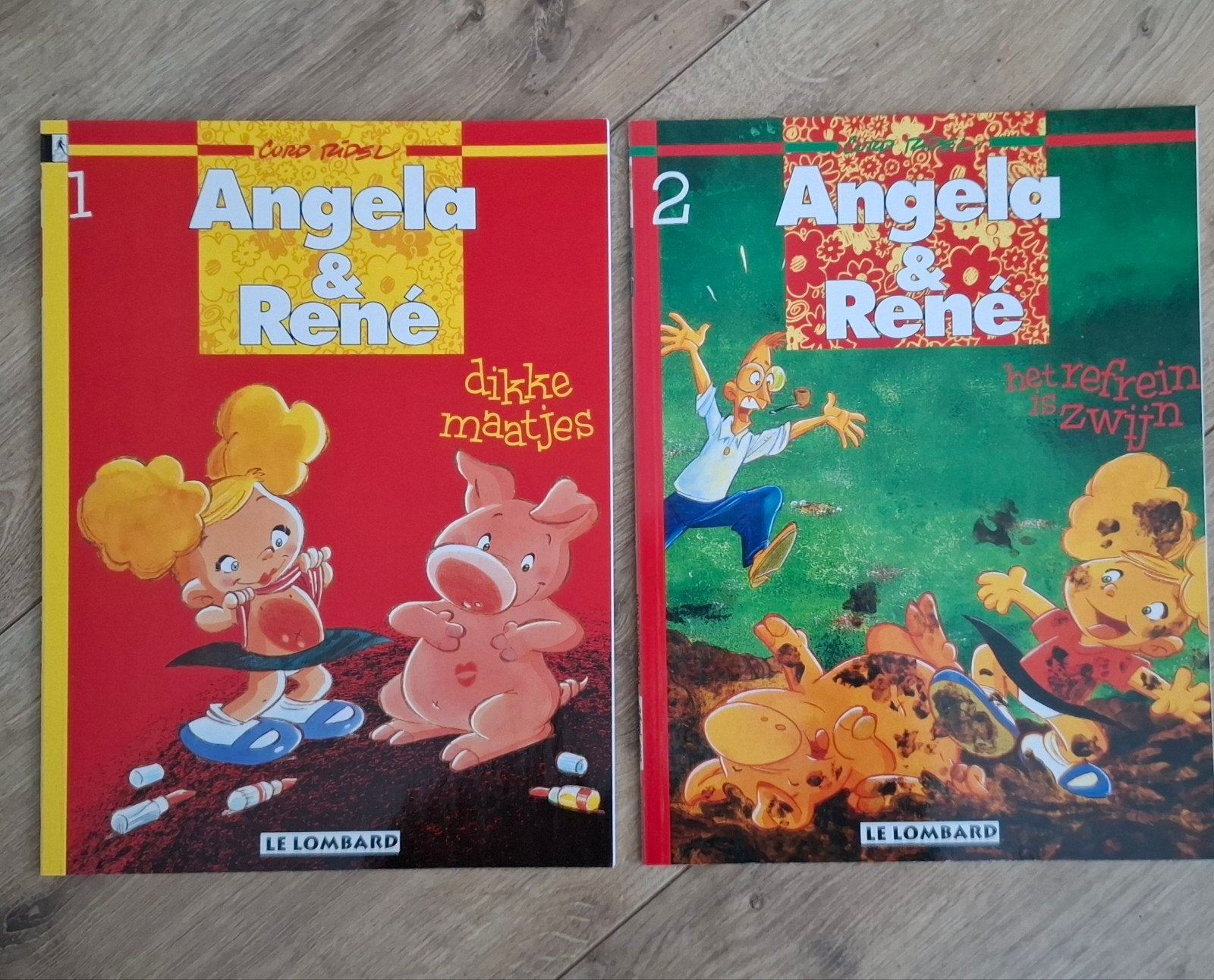 Angela & René - Dikke Maatjes & Het Refrein is Zwijnen, Boeken, Meerdere stripboeken, Ophalen of Verzenden, Zo goed als nieuw