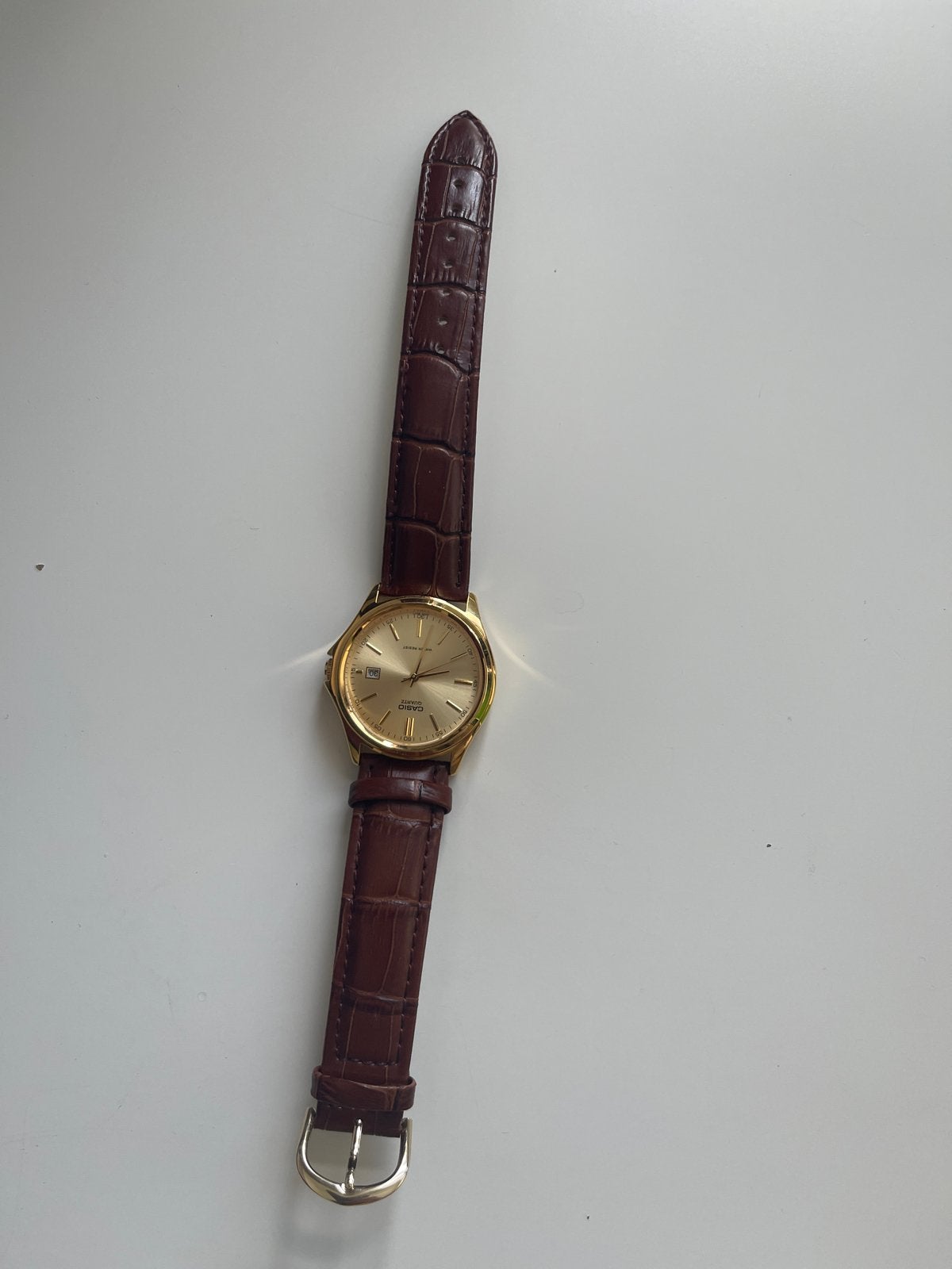 Casio Polshorloge Goudkleurig met Bruine Leren Band, Sieraden, Tassen en Uiterlijk, Horloges | Heren, Leer, Polshorloge, Ophalen of Verzenden