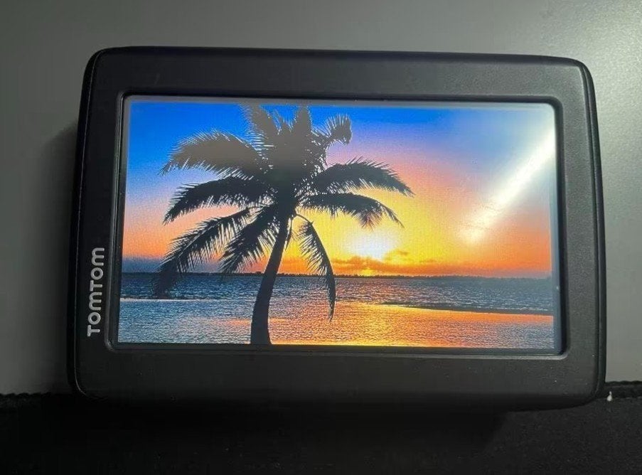 TomTom home ( Z1230 GPS navigatiesysteem, model 4EN42)., Ophalen of Verzenden, Gebruikt