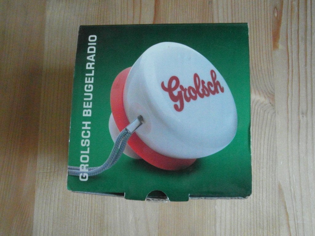 Grolsch beugelradio inclusief oordopjes, metalen wandplaten, Ophalen of Verzenden, Nieuw, Gebruiksvoorwerp