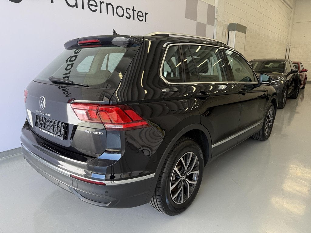 Volkswagen Tiguan 1.4 TSI eHybrid Carplay / Adaptive Cruise, Auto's, Stof, 4 cilinders, Zwart, Hybride Elektrisch/Benzine